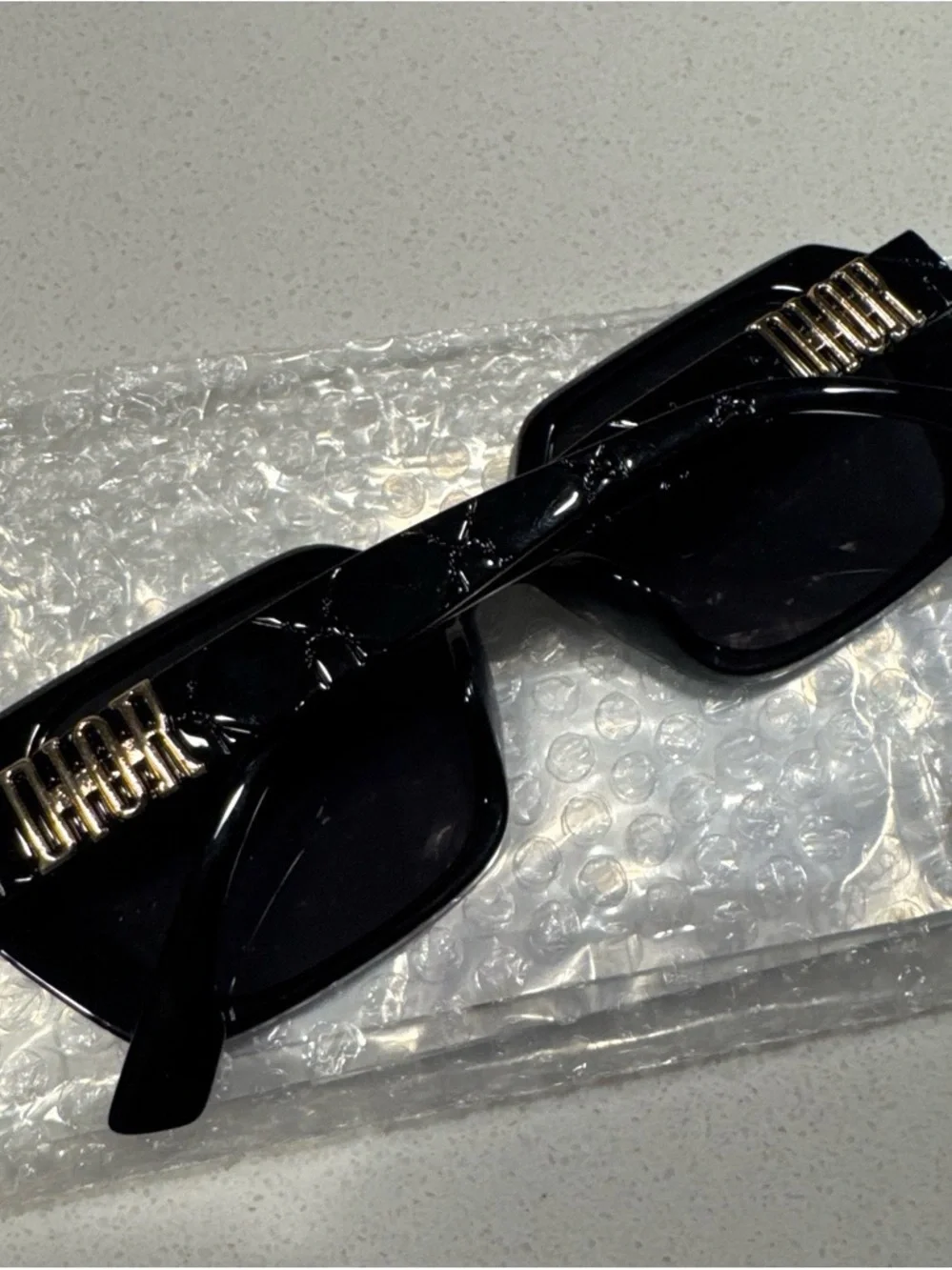 Black Rectangular Sunglasses with Gold Accents